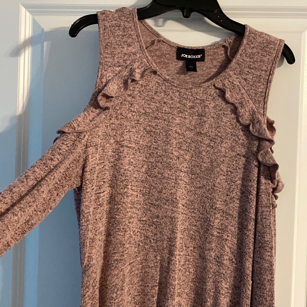 Super comfy dress. Cute for the office or casual. Flattering to all sizes.